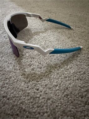 Oakley White Frame Sunglasses with Blue Temples and Purple Lenses